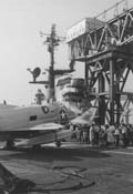 Port view of the island with A-4 Skyhawk in the foreground